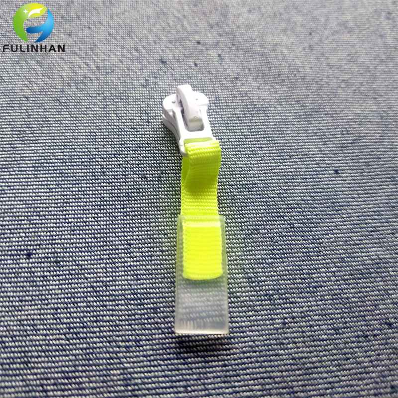 Custom woven zipper pullers Custom woven zipper pullers