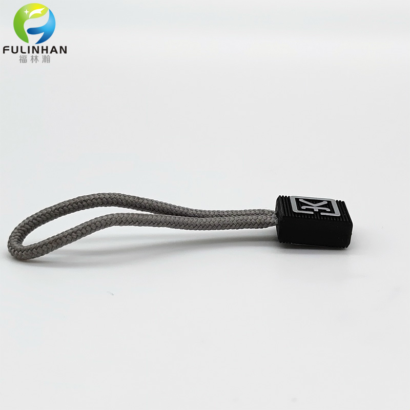 zip puller with embossed logo zip puller with embossed logo