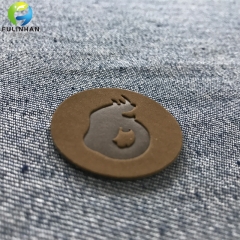 Patch in pelle stampata a logo per i jeans