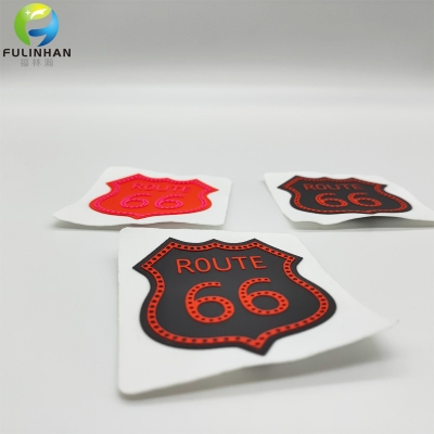 etichette per indumenti in silicone con stampa personalizzata all'ingrosso